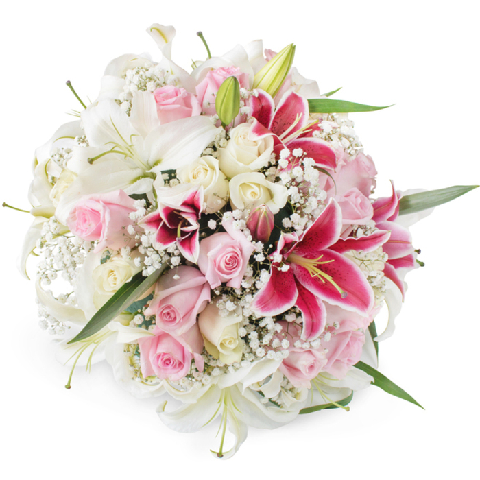 A beautifully composed floral bouquet is shown against a clean white background, its rounded, full shape giving the impression of care and precision from a local Grove Park florist. The arrangement is dominated by generous white lilies, their long, slightly recurved petals opening from elongated buds into stately, trumpet-shaped blooms that exude a sense of purity and calm. Between these lilies nestle numerous roses in soft blush pink and creamy ivory tones, each head thoughtfully placed so that their velvety petals can be appreciated: some are still tightly furled at the centre, while others expand into open cups with layered, romantic whorls. Introducing vivid contrast, several deep pink and magenta Oriental lilies, likely of the Stargazer type, rise among the paler flowers; their petals, dipped in intense fuchsia and scattered with darker speckles near the throat, create eye-catching bursts of colour that naturally draw attention. Delicate sprays of white baby's breath weave in and out of the structure, their countless tiny flowers acting like a fine lace overlay, softening the transitions between the larger, bolder blooms. Glossy green foliage, mostly narrow lily leaves and discreet rose leaves, peeks from the edges and beneath the blossoms, adding movement and a fresh garden feel reminiscent of walks through nearby Grove Park and along the river. Perfectly lit with bright, even light, every detail stands out, from the gentle curves of lily petals to the padded texture of rose centres. The overall mood radiates gentle celebration and heartfelt sentiment, ideal for marking engagements, anniversaries, or sending a comforting, elegant message to loved ones across Grove Park.