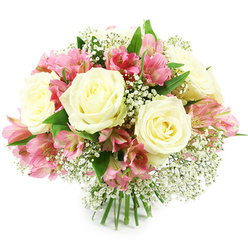 A rounded bouquet brimming with creamy white roses, bright pink alstroemeria, and delicate sprays of baby's breath rests against a clean white background, exuding the calm refinement of a design created in Grove Park. Several generous white roses anchor the arrangement; their petals unfold in soft spirals, each layer catching the light differently to reveal subtle shadows and a whisper of pale yellow at the heart. Between these classic blooms, clusters of alstroemeria introduce energy and contrast. The Peruvian lilies display multiple star-like flowers per stem, each trumpet-shaped bloom painted in shades of pink that range from soft and romantic at the outer edges to a more vivid fuchsia near the throat, accentuated by fine dark speckles, much like the varied textures found in the leafy streets around Grove Park and nearby Chiswick. Interlaced throughout the bouquet, baby's breath scatters tiny white blossoms on thin, branching stems, creating a gauzy, cloud-like layer that softens transitions between the larger flowers and gives the design an almost ethereal quality. Surrounding and supporting the blooms, fresh deep green leaves add structure and a natural, garden-fresh feel, as though the bouquet had just been gathered from a hidden riverside garden near the Thames. The stems at the base are visible, neatly trimmed and gathered together in a professional hand-tied finish, ready to be placed into a favourite vase on a Grove Park dining table or windowsill. Bright, even lighting reveals every detail: the velvety rose petals, the delicate alstroemeria markings, and the airy clusters of gypsophila, combining to express affection, gratitude, or celebration in a way that feels personal and local to the Grove Park community.