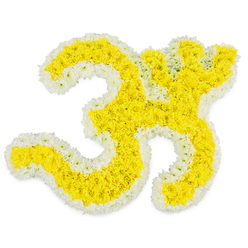 The photograph captures an intricate floral rendering of the sacred Om symbol, built entirely from fresh yellow and white flowers and set against a clear, pure white background. At the heart of the design, countless small yellow blossoms, likely chrysanthemums or marigolds, are packed so tightly that they form a seamless field of golden petals. The curves of the Om-broad at the base, then gently folding inward into rounded loops and a subtle crescent-are sculpted with care, giving the symbol a soft but well-defined presence. Running along the outer edges is a precise border of crisp white blooms, outlining each turn and flourish, including the separate dot above that completes the character. This white edging provides strong visual contrast, highlighting the symbol's familiar form and lending it an air of purity and reverence. The lighting is bright and evenly spread, with minimal shadows, so that the yellow glows warmly and the white remains clean and serene. There is nothing else in the frame; the focus remains entirely on the floral Om, as if suspended in stillness. In the mind's eye, you might place this tribute in a quiet room in Grove Park, perhaps at a funeral or celebration of life, where family members and friends gather in remembrance. The gentle fragrance of fresh flowers would offer a subtle comfort as prayers and stories are shared. This thoughtful arrangement bridges artistry and devotion, providing a meaningful way to honour a loved one while staying true to spiritual and cultural traditions.