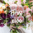 A close, tender portrait of a gardener's arm of flowers: a hand-tied bouquet captured slightly elevated, its textures and colours arranged like a private garden. Soft pastel pink garden roses dominate, their many velvety petals folded like ruffled silk and opening to reveal warm, fragrant centres. Around them sit delicate blush and cream sweet peas with faint purple striping, their papery petals dancing above slender stems. Peach and coral ranunculus-style blooms add layered, cup-like depth, while clusters of deep plum hellebores or similar textured florets provide a dramatic counterpoint that grounds the composition. Lush, varied foliage - from slender trailing vines to broader matte leaves, perhaps a hint of eucalyptus - threads through the bouquet, giving it that free, garden-style silhouette and a fresh green backdrop. Soft, natural light sculpts each petal, catching the subtle sheen on the roses and the fine veins on the sweet peas, while a shallow, blurred background keeps all attention on the flowers. Centrally superimposed over the blooms is a neat white rectangular frame bearing the words Florist Choice in an elegant script with CHOICE in smaller uppercase beneath, and a prominent ?100 in bold sans-serif at the base, clearly indicating the florist-selected product and price. A pair of hands cradles the stems at the bottom, sleeves softly out of focus, suggesting careful presentation and a human touch. The overall mood is romantic and artisanal - a bespoke offering that reads as a thoughtful, luxurious gift for birthdays, anniversaries, wedding moments, or simply to say you care.