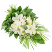 A tranquil white and green sympathy spray is photographed against a bright white background, its design arranged on a gentle diagonal, as if laid along the front of a funeral lectern or chapel rail in Grove Park. At the heart of the arrangement, large white Oriental lilies bloom in full trumpet form, their broad, velvety petals unfurling to expose pale yellow-green stamens, while a number of buds stand upright, adding balance and height. Surrounding them is a soft gathering of creamy white roses and ruffled carnations, their layered petals building a sense of comfort and tenderness. White Gerbera-style daisies, each with a fine cream or yellow centre, are spaced throughout the spray, bringing a clean, modern touch to the overall look. Fine white filler flowers are scattered delicately between the larger blooms, giving a light, almost airy veil that ties everything together. The floral cluster sits on a bed of varied foliage: shiny, dark green leaves provide a solid foundation; delicate fern fronds introduce lightness and movement; and round eucalyptus leaves with their muted blue-green tone offer a gentle, calming accent. Near the upper area, several long, narrow leaves are thoughtfully looped and folded, a subtle detail that reflects expert florist craftsmanship. From the lower right, slender palm fronds extend outward in a graceful fan, creating an elongated, asymmetric profile that feels both classic and contemporary. The combination of pure white flowers and mixed greenery conveys peace, reverence, and quiet strength, making this an apt funeral or memorial tribute for families across Grove Park, whether gathering near the station, along Burlington Lane, or beside the leafy river paths.
