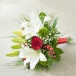 Presented on a softly illuminated, neutral surface, this exceptional hand-tied bouquet showcases the elegant fusion of tradition and whimsy that characterizes the floral work in Grove Park. The bouquet rises with the regal heights of white lilies-some fully open and luminous, others as elongated buds full of promise-centering a richly hued deep red rose whose velvety spiral draws the gaze with a sense of passion and depth. Around these, plush green trick dianthus spheres and fine trails of airy gypsophila evoke the texture of meadows in Dukes Meadows Park, while polished clusters of red hypericum berries add joyful, festive splashes. The arrangement's fullness is achieved with a medley of glossy, broad-leaved foliage and delicate, feathery greens, forming a lush botanical base. Finishing the bouquet, a radiant red satin ribbon wraps the stems into a refined, cohesive handle. Expertly crafted by Grove Park Florist, and inspired by the local landscapes and community warmth, this bouquet lends itself to marking life's milestones-weddings, anniversaries, heartfelt celebrations-with purity, affection, and an unmistakable sense of local artistry.