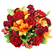 Seen from a gentle top-down viewpoint against a clean white background, this densely packed, perfectly rounded bouquet combines deep, velvety red roses and brilliant orange Asiatic lilies into an opulent study of warm hues. Several large, fully opened crimson roses dominate the centre, their velvet petals unfurling to reveal layered, complex hearts that read as classic romance; around them cluster smaller, wine-toned spray roses whose tight, miniature blooms add a plush, jewel-like texture and deepen the colour story. Bright orange trumpet-shaped lilies punctuate the composition, some flaring wide with visible stamens and mottled markings, others paused in elegant buds that promise continued opening - the contrast between open and closed forms gives the bouquet a living, breathing rhythm. Scattered glossy red hypericum berries lend playful, spherical highlights that catch soft studio light, and broad, fresh green leaves-likely ruscus or salal-peek between blooms, their sheen and cool tone setting the warm palette firmly in relief. The lighting is soft and even, picking out the velvety surfaces of rose petals and the satiny sheen of lily petals without harsh shadows, so every curve and fold reads clearly. There is a subtle scent implied - the honeyed depth of roses undercut by the citrus-spice lift of lilies - and an overall impression of celebration and intimacy, perfect for anniversaries, romantic gestures, or a warm autumn table. As a local arrangement often requested by residents near Grove Park station and the nearby Nature Reserve, it pairs well with indoor displays or as a statement gift for loved ones who treasure classic, richly coloured florals.