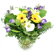 On a crisp white backdrop, a lush, multi-hued bouquet waits in a simple glass vase, its yellow gerbera daisies beaming with optimism as lavender lisianthus drift through, some fully opened and others resting in bud. White calla lilies add an architectural glow with their smooth, trumpet-shaped petals, while clusters of white alstroemeria bear hints of yellow. A generous spray of greenery-silvery eucalyptus and broad emerald leaves-frames the arrangement, giving fullness and a fresh, garden-like scent. The stems are visible through the clear vase, neatly bound by a slender black tie that keeps everything aligned as water gleams around them. It reads as a thoughtful gift for birthdays, anniversaries, or a bright everyday gesture, a bouquet that promises warmth and confidence. In Grove Park, this design makes an elegant centerpiece for a kitchen table, a reception desk, or a living room corner, and it can travel quickly to doors with reliable same-day delivery across the area, bringing sunshine and a touch of sophistication to any room.