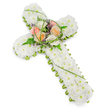 A refined sympathy cross made of fresh flowers lies against a bright white background, its design radiating quiet respect and remembrance. The cross is completely blanketed in small, round-headed white chrysanthemums or similar blooms, each one placed closely beside the next. This creates a smooth, plush texture that resembles a soft, white cushion stretching from the top of the cross to the base and across both arms. The flowers look freshly cut and perfectly conditioned, their pure white petals symbolising innocence and peace. Encircling this blanket of white is a fine band of vivid green, formed by neatly trimmed foliage and tiny green flower clusters. This slim edging frames the cross and adds a clear outline, much like the tidy garden borders found around homes and communal spaces in Grove Park. At the centre, where the vertical and horizontal beams meet, a subtle yet expressive burst of colour draws the eye. Several roses in tender shades of peach, apricot, blush pink, and creamy ivory bloom together, their petals layered and gently unfurling. They rest among delicate fern fronds, slender loops of green grass, and small hints of purple filler blossoms that add a soft haze of lavender to the composition. The lighting is even and soothing, without harsh contrast, allowing the textures and tones to blend harmoniously. This floral cross would be a thoughtful choice for a church service, crematorium, or graveside farewell in Grove Park, carrying a message of faith, love, and peaceful goodbye for a cherished life.