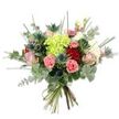 A hand-tied bouquet photographed against a crisp white backdrop, its vivid colours and textures presented with quiet confidence. At the centre sits a generous, cloud-like cluster of lime-green hydrangea whose tiny, tightly packed florets catch the light and read as a soft, luminous heart. Surrounding this are several deep, velvety red roses, their spiralled petals lending classic romance, and a scattering of pastel pink and cream roses that unfurl more gently, bringing tenderness and a blush of warmth. Coral-pink carnations with frilled, ruffled edges add energetic pockets of texture and a cheerful warmth between the larger heads. Cool, architectural Eryngium thistles - metallic blue-grey and spiky - punctuate the composition, offering a striking modern contrast and an almost seaside, sculptural quality. The bouquet is filled with silvery-green eucalyptus leaves, their rounded shapes and subtle sheen giving an aromatic, contemporary backdrop, while long, thin blades of fresh green grass and slender filler foliage reach outwards to create airy movement and vertical rhythm. The stems are gathered and tied with a natural fibre tie that hints at artisanal handcraft; the exposed green stems show the bouquet's freshly cut vitality. Bathed in soft, even daylight, the arrangement balances softness and structure, making it suitable for a quiet anniversary, a joyful birthday, or as a stylish centrepiece. As a florist who often delivers to nearby Chinbrook Meadows and Grove Park Station, I picture this arrangement brightening a kitchen table or being carried across a leafy Grove Park street - an elegant, tactile expression of care and seasonal freshness.