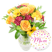 A warm, celebratory bouquet sits against a crisp white background, its colours and textures arranged to feel like a personal embrace. At the heart of the composition are full, peachy-orange roses with petals curling in soft spirals; their gentle fragrance seems to lift from the glass as if caught in a slant of morning light. Sunlit yellow gerbera daisies punctuate the cluster with flat, cheerful faces and dark centres that give the arrangement a sunny focal rhythm, while deep burgundy carnations add plush, ruffled depth and a velvety contrast that grounds the warmer tones. Slender white alstroemeria threads through the bouquet, its delicate speckled petals lending an airy, refined note between the larger blooms. A generous halo of glossy green foliage-broad leaves and fine sprigs-frames the stems and provides a fresh, garden-picked backdrop. The flowers are gathered in a simple clear glass vase so clean you can see the neatly trimmed stems and shimmering water inside, a small honesty that speaks to freshness and careful handling. To the lower right, slightly overlapping the vase, a round white foil balloon sparkles with scattered gold and hot-pink confetti dots and tiny heart motifs; across its centre the handwritten message Best Mum is scripted in flowing fuchsia, playful and tender. The overall mood is bright, affectionate and quietly festive-an ideal floral and balloon pairing for Mother's Day, a birthday, or any occasion where you want to make a local Grove Park mum feel cherished, whether leaving at the front door near Grove Park station or hand-delivered to a nearby flat in Lee.